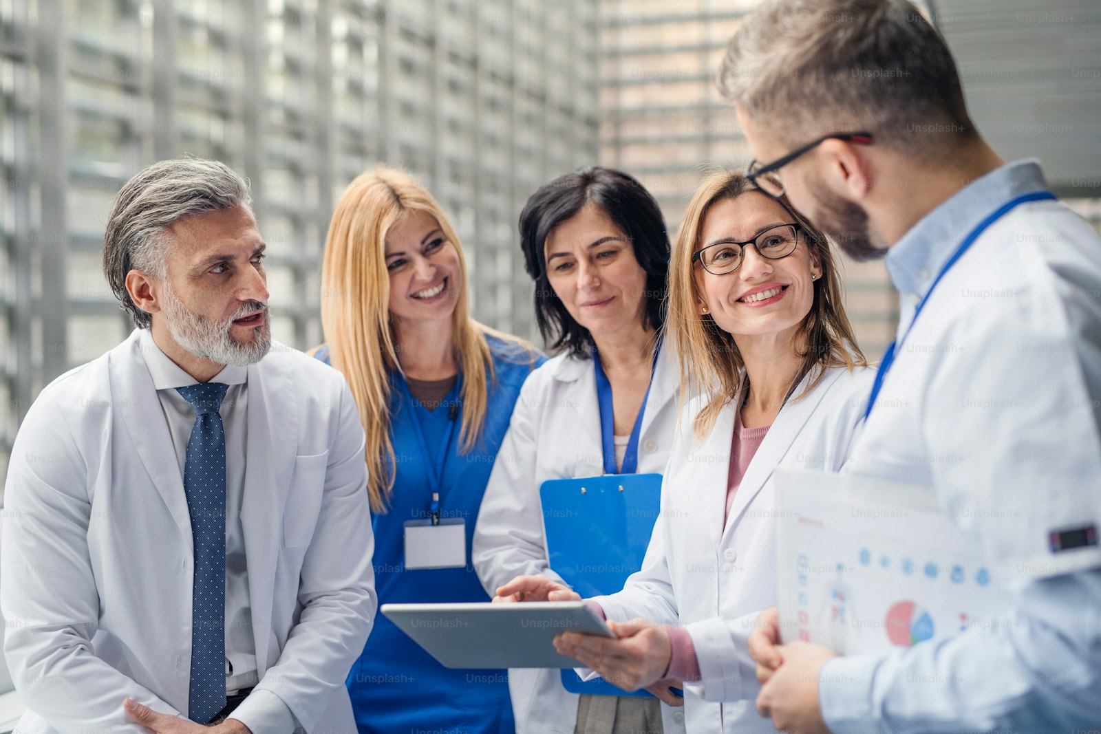 A medical team standing together in discussion