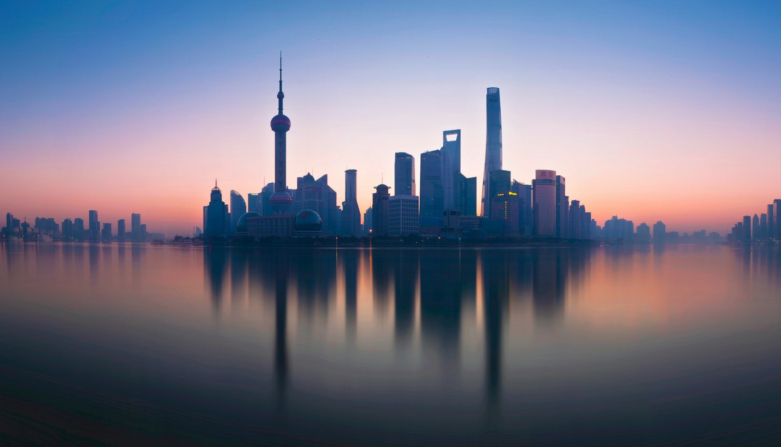 The Lujiazui skyline reflected in the Huangpu River, seen from the Bund