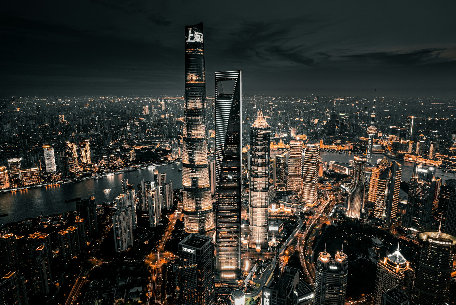 The illuminated Shanghai skyline at night along the Huangpu River